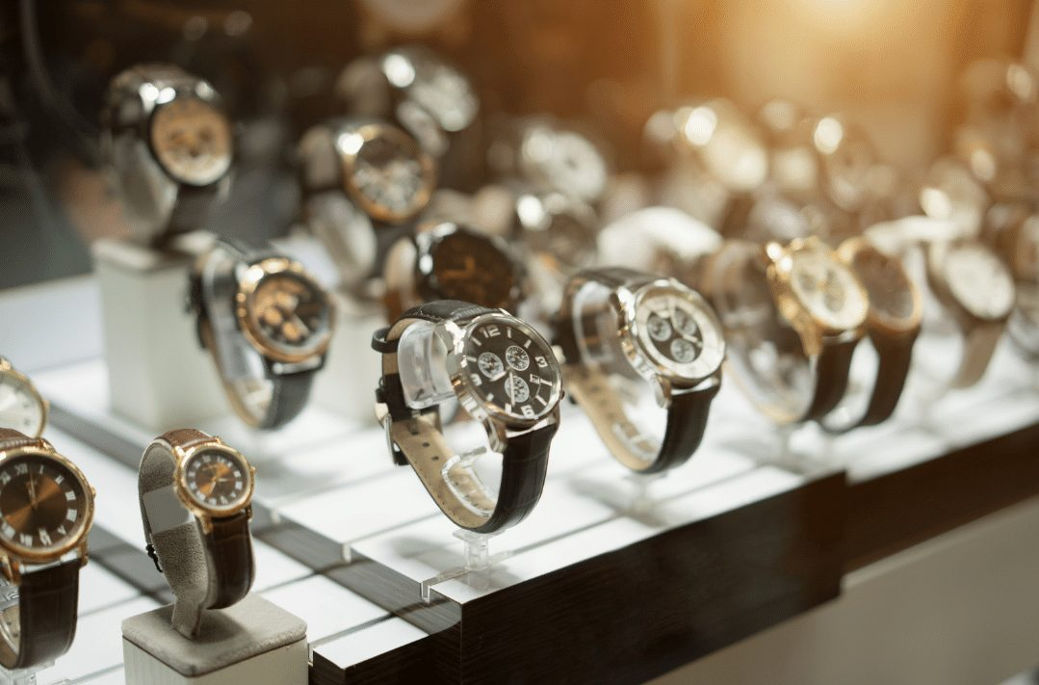 Luxury watches displayed in a jewelry store near Philadelphia, showcasing high-end timepieces available for appraisal and purchase.